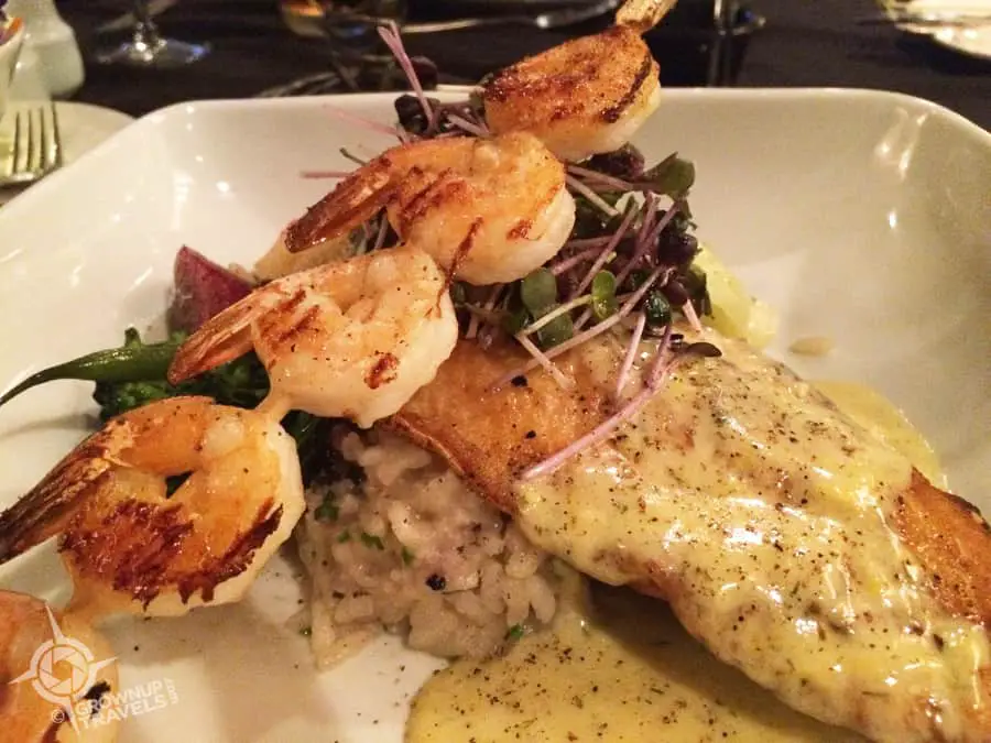 Lake trout and shrimp over risotto with a lemon dill sauce from Grape and Olive Wine Bar and Bistro.