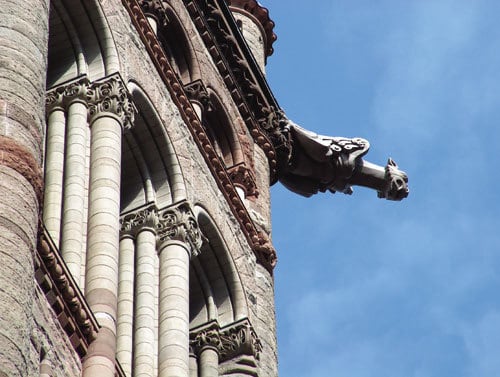 Special-interest tours can point out details (like the story behind these gargoyles on Toronto's city hall)  