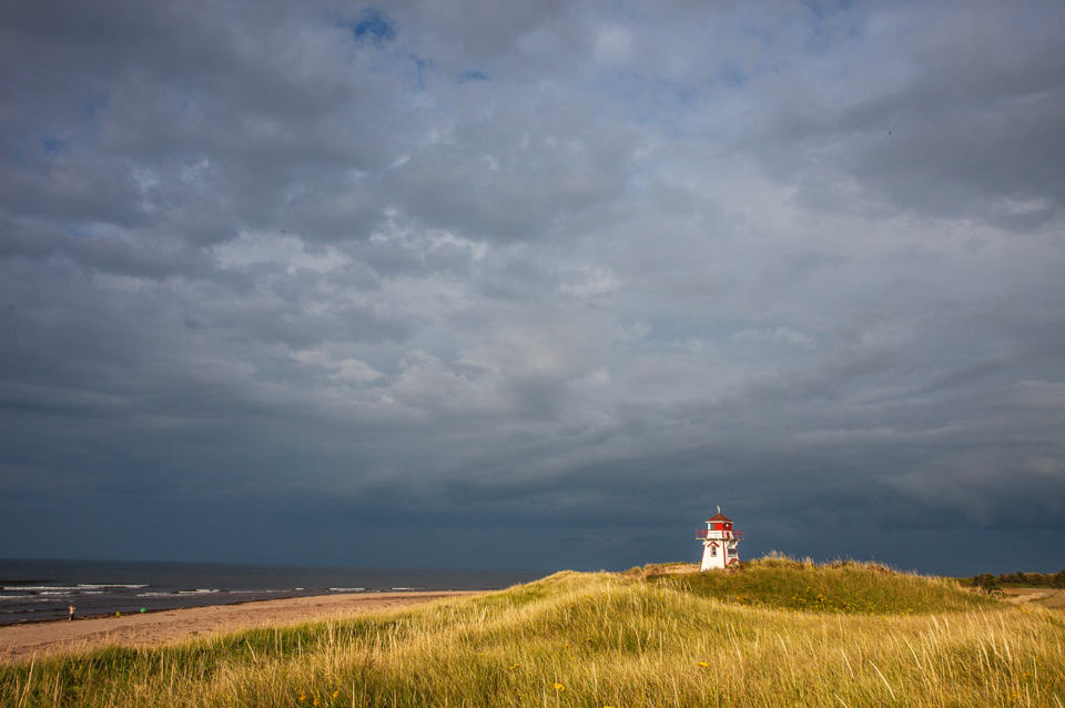 A break in the clouds at dusk meant brilliant lighthouse light at Covehead Bay, PEI.
