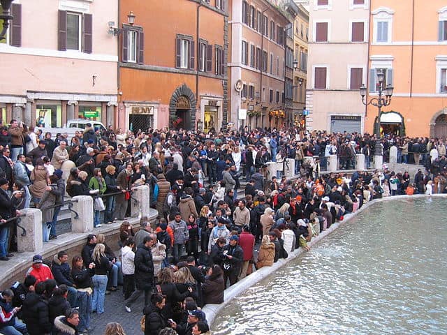 The Trevi Fountain always draws huge crowds of tourists.