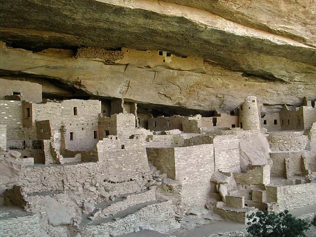 Ancient cliff dwellings built into the sides of mesas in Mesa Verde National Park