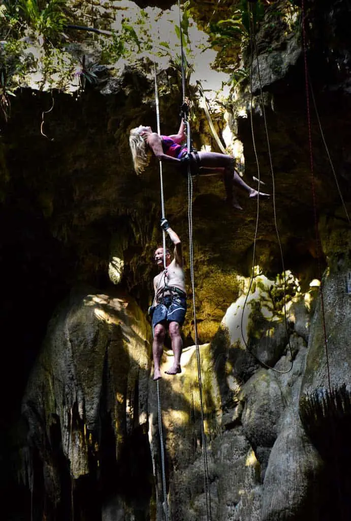 Jane hanging Henk below Cenote Maya