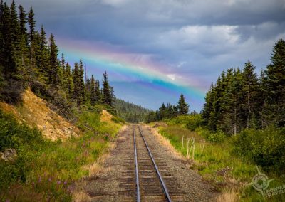 Rainbow on Yukon train tracks