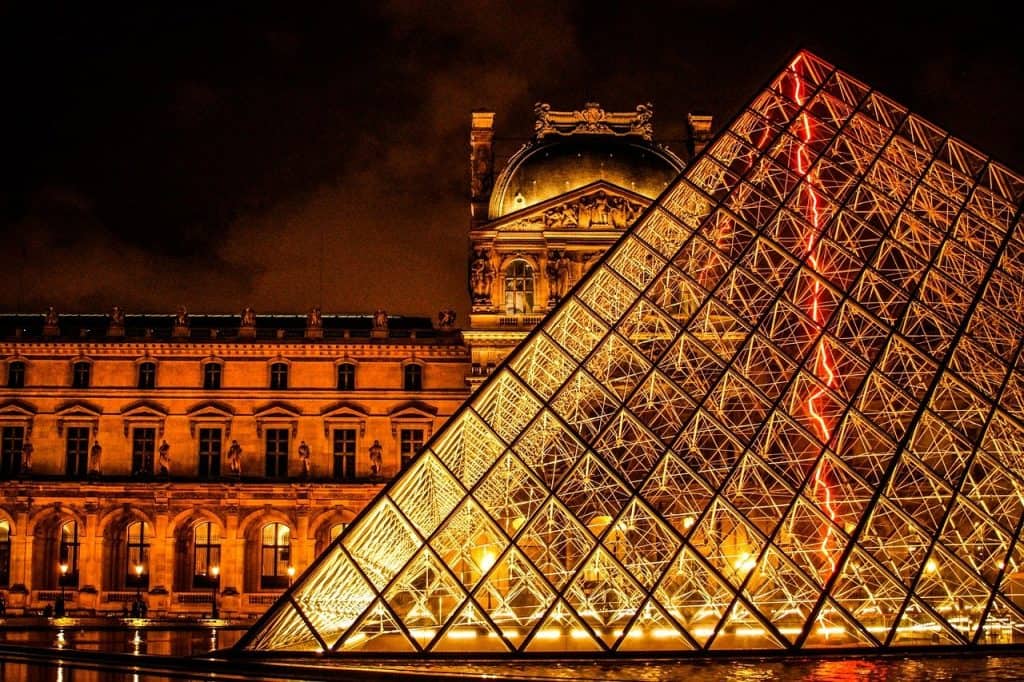 the louvre pyramid at night