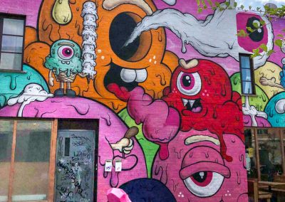 Montreal Public Buff Monster mural with pink hippo