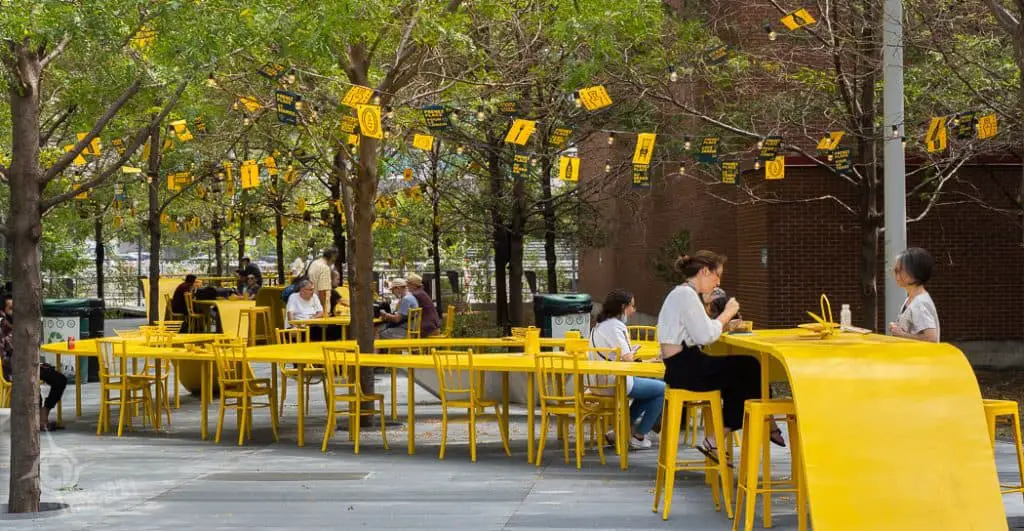 Yellow outdoor tables art Montreal