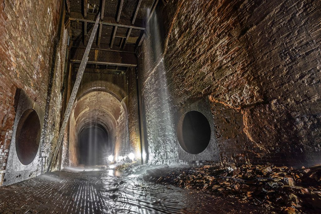 Pre-restoration photo of arched supports in the Wheel pit Niagara Power Station *Photo Niagara Parks