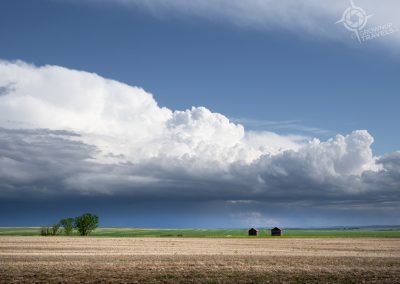 rain clouds over prairie near Drumheller Alberta