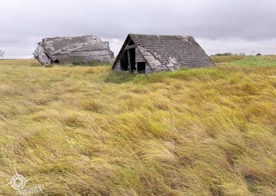 Collapsed buildings and waves of grass Saskatchewan-13