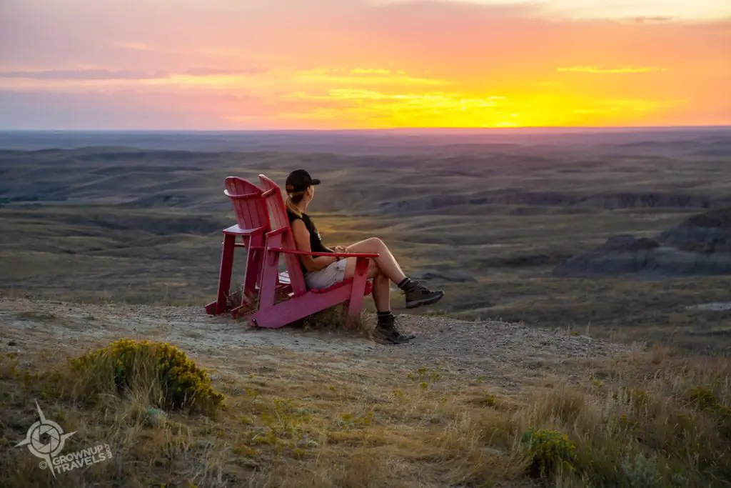 Sunset Jane on red chairs Grasslands National Park East Block