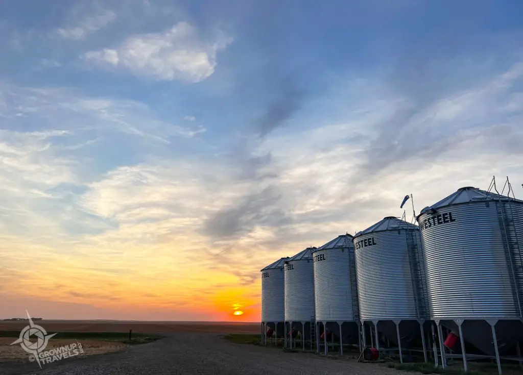 Sunset with grain bins Alive Sky Lodge