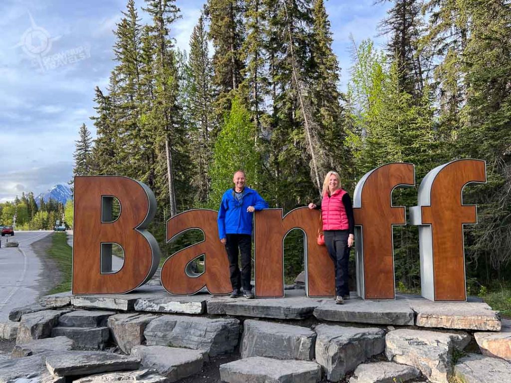 Banff sign with Jane and Henk