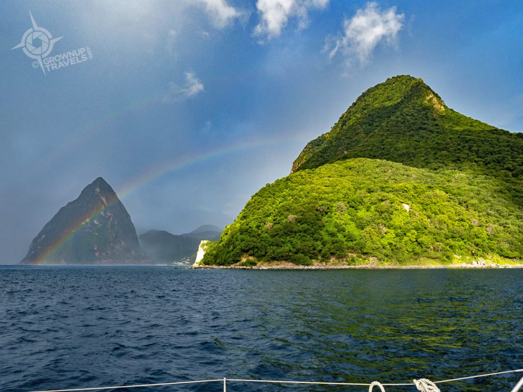 rainbow over piton from catamaran