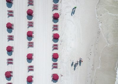 Fort Myers beach umbrellas overhead shot