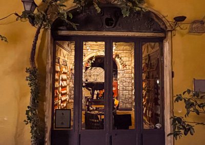 Shop at night doorway Rome