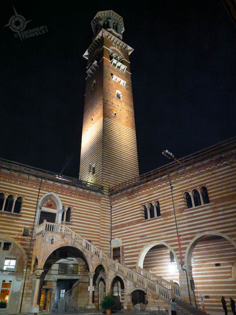 Lamberti clock tower from Cortile Mercato Vecchio at night Verona