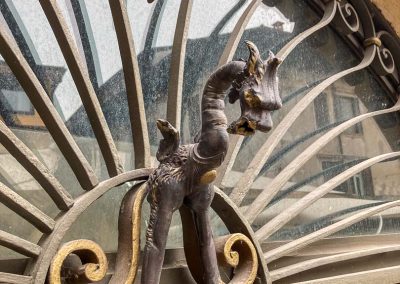 Osteria Ponte Pietra window detail of dragon Verona