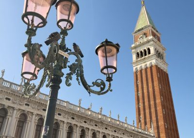 Pink street lamps and campanile Venice St. Marks Square