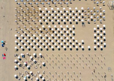 Caorle beach umbrellas overhead gameboard