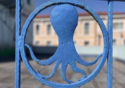 Caorle blue octopus railing