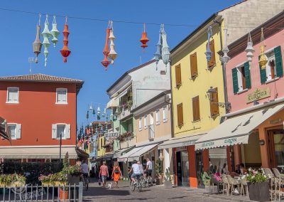 Caorle street with cafes