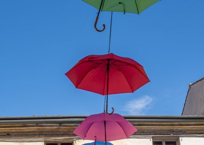 Cittadella colourful umbrellas against sky