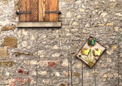 Poffabro stone wall with decorations