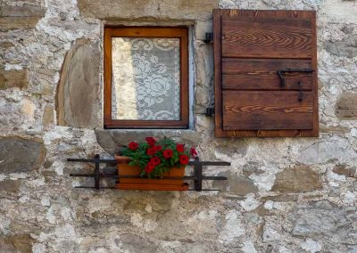 Poffabro window with lace and shutters