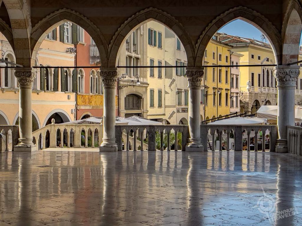View through Palazzo del Comune of Via Vecchiamercato Udine