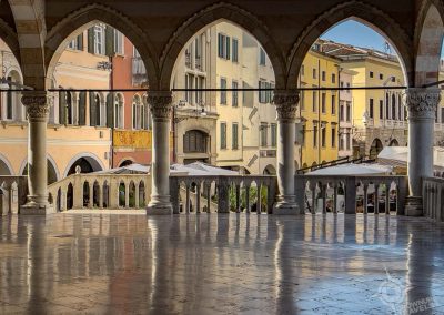 View through Palazzo del Comune of Via Vecchiamercato Udine