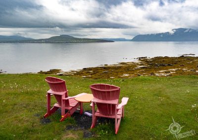 Parks Canada red chairs at Lobster Cove Head lighthouse-2