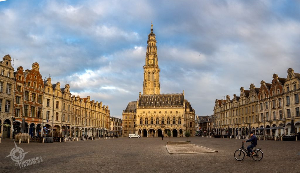 Arras Place des Heroes morning light with cyclist