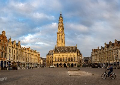 Arras Place des Heroes morning light with cyclist