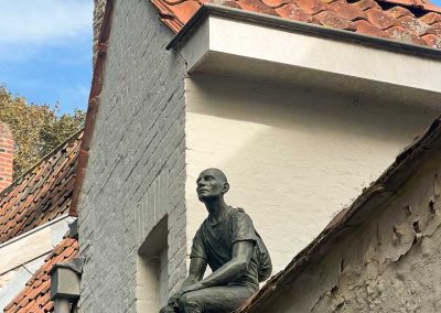 Laneway sculpture in Bruges Belgium