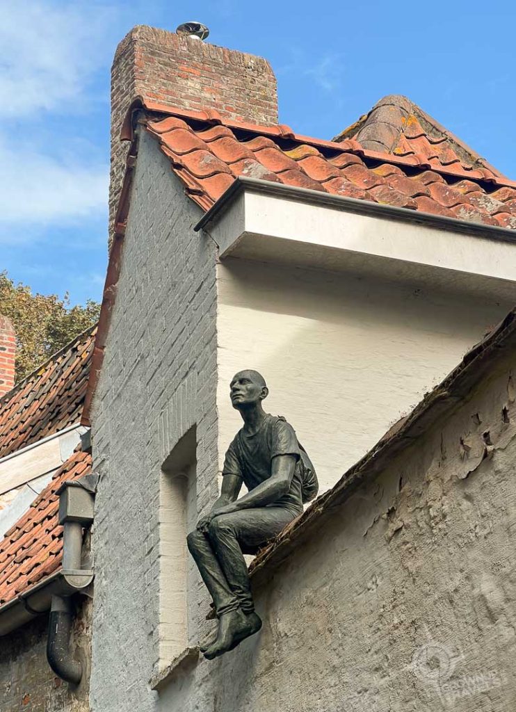 Laneway sculpture in Bruges Belgium
