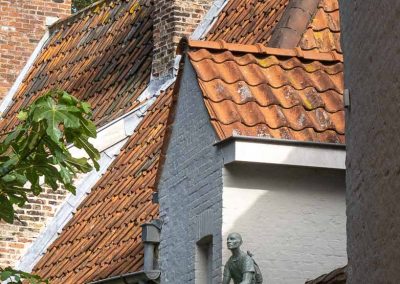 Laneway sculpture in Bruges Belgium
