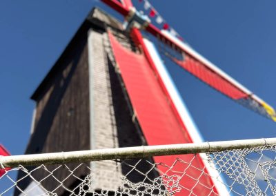 Windmill in Bruges with 'lace' fencing