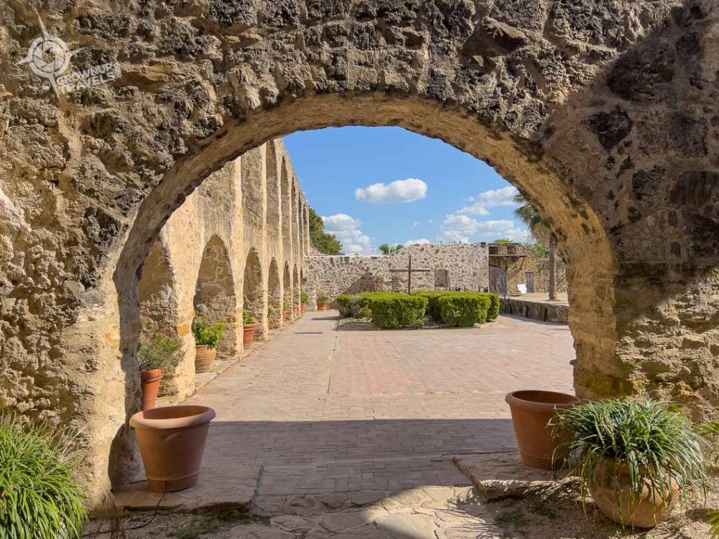 San Jose mission courtyard through archway San Antonio