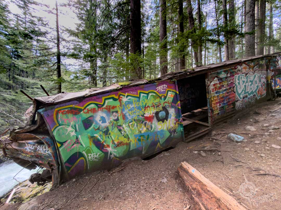 Boxcar on edge of gorge on Train Wreck Trail near Whistler