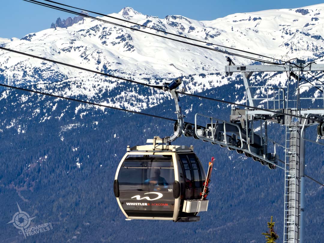 Blackcomb Gondola with spring skier Whistler BC