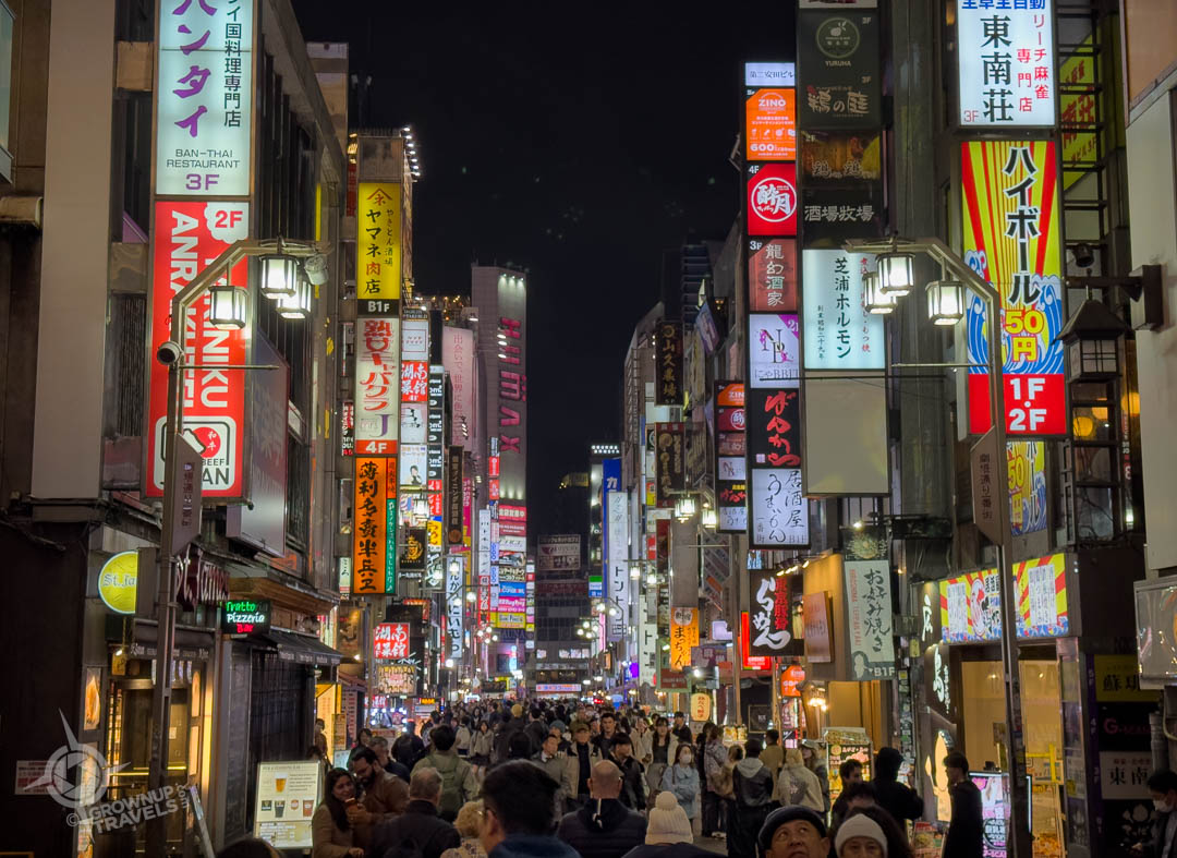 Tokyo street with people at night